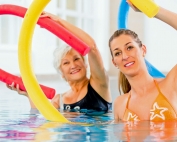 Fibromyalgia Treatment: Aquatic vs Land Aerobic and Stretching Exercises