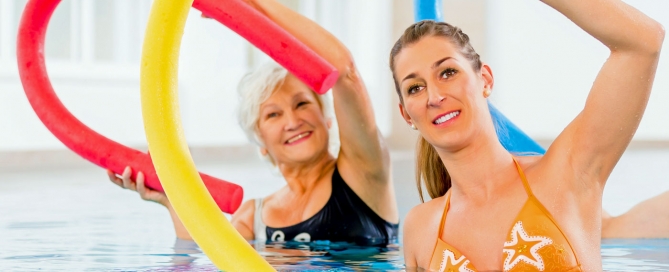 Fibromyalgia Treatment: Aquatic vs Land Aerobic and Stretching Exercises